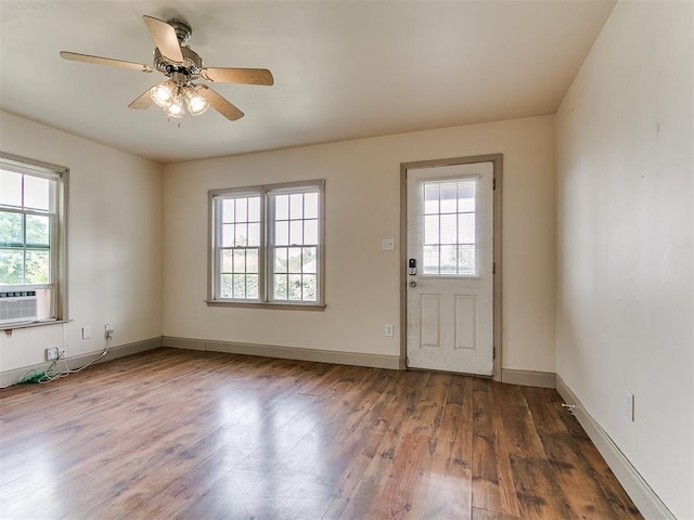 3617 N Westmont St, Oklahoma City, OK 73118 - doorway to outside with plenty of natural light, wood finished floors, ceiling fan, and baseboards