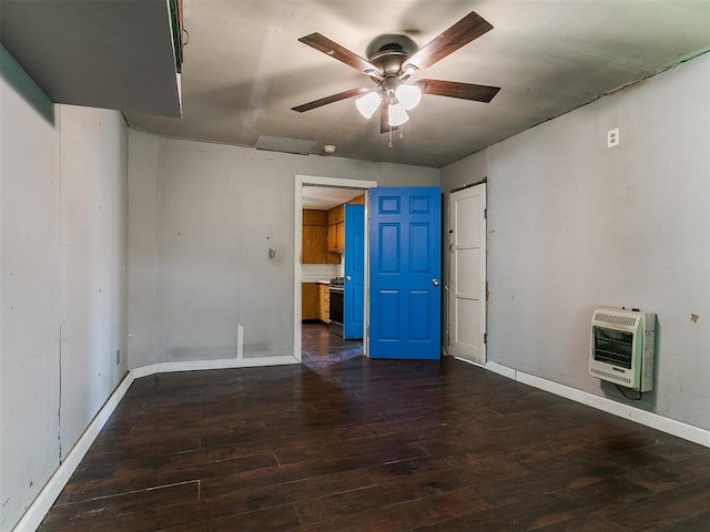 3617 N Westmont St, Oklahoma City, OK 73118 - empty room with heating unit, wood finished floors, and ceiling fan