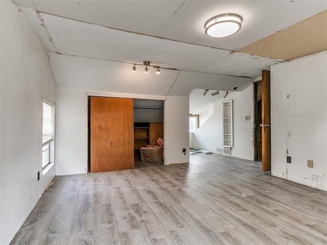 3617 N Westmont St, Oklahoma City, OK 73118 - unfurnished living room with wood finished floors