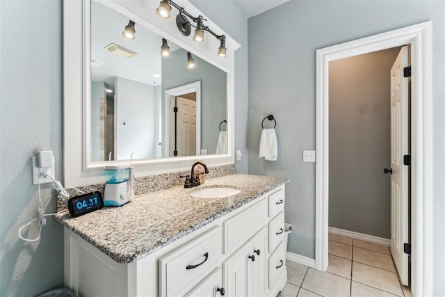 11423 Village Ave, Midwest City, OK 73130 - bathroom with tile patterned flooring and vanity