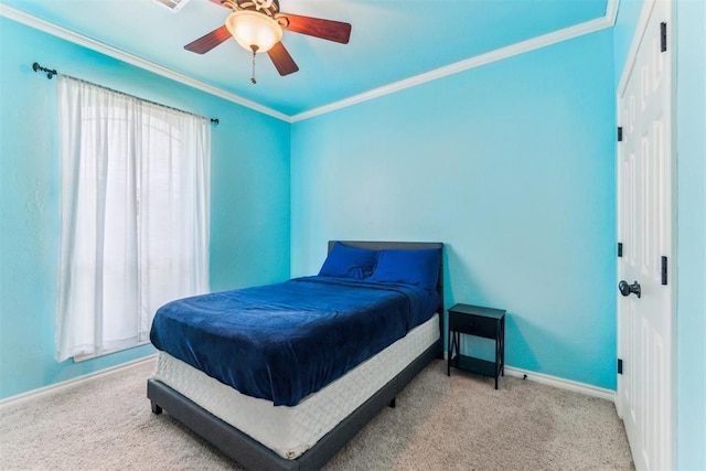 11423 Village Ave, Midwest City, OK 73130 - bedroom with carpet floors, baseboards, crown molding, and ceiling fan
