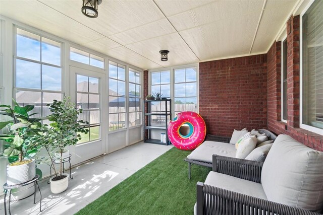 11423 Village Ave, Midwest City, OK 73130 - sunroom with an outdoor hangout area
