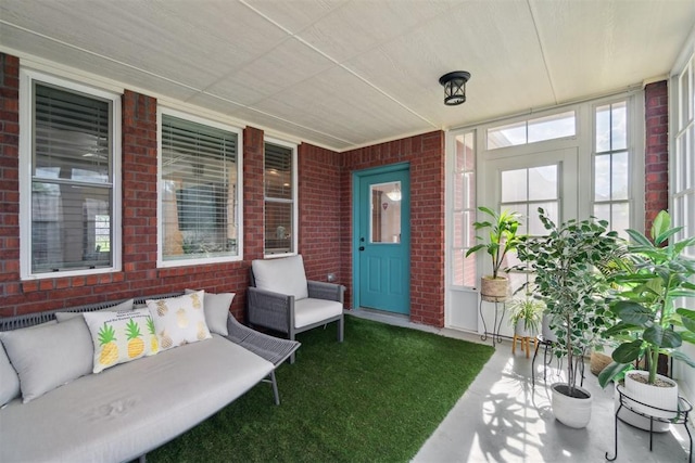 11423 Village Ave, Midwest City, OK 73130 - sunroom / solarium featuring an outdoor living space