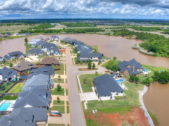 8916 NW 130th St, Oklahoma City, OK 73142 - aerial view of residential area featuring a nearby body of water