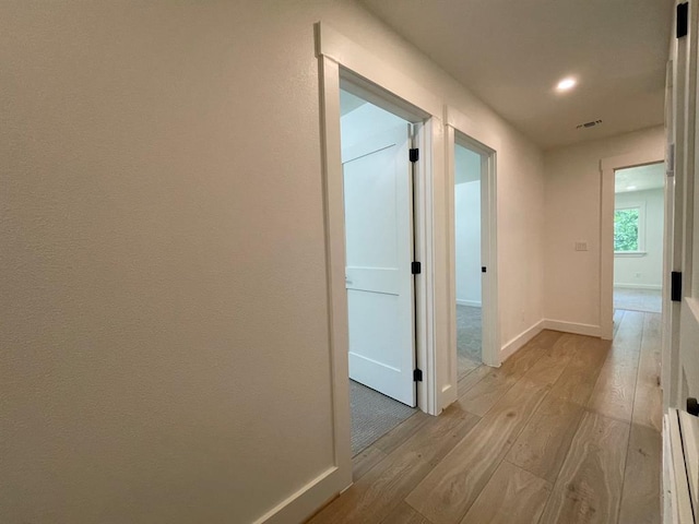 1920 Glover Golden Rd, Broken Bow, OK 74728 - hall featuring light wood-style floors, baseboards, and recessed lighting