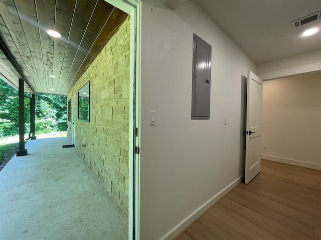 1920 Glover Golden Rd, Broken Bow, OK 74728 - hallway with electric panel, wood finished floors, baseboards, and recessed lighting