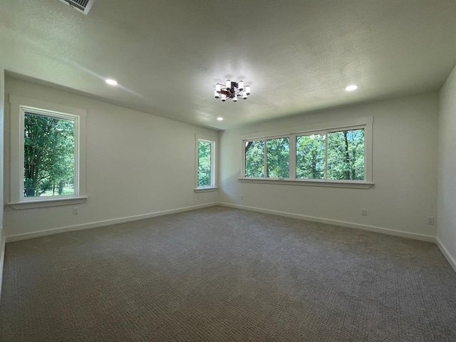 1920 Glover Golden Rd, Broken Bow, OK 74728 - carpeted empty room featuring recessed lighting, baseboards, and a textured ceiling