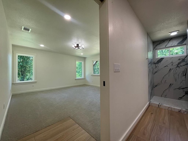 1920 Glover Golden Rd, Broken Bow, OK 74728 - hallway with a textured ceiling, baseboards, wood finished floors, and recessed lighting