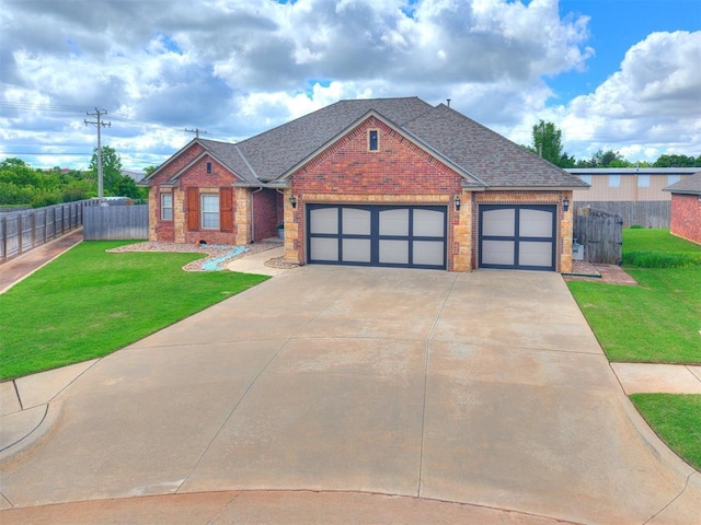 traditional-style house featuring brick siding, an attached garage, concrete driveway, and roof with shingles