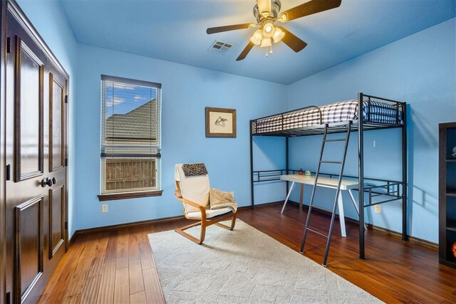 1401 Canyon Bridge Ln, Edmond, OK 73034 - bedroom with hardwood / wood-style floors and baseboards