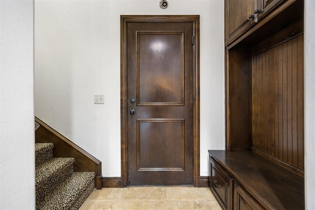 1401 Canyon Bridge Ln, Edmond, OK 73034 - mudroom with baseboards and light tile patterned floors