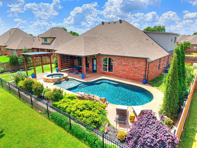 view of pool featuring a patio area and a pool with connected hot tub