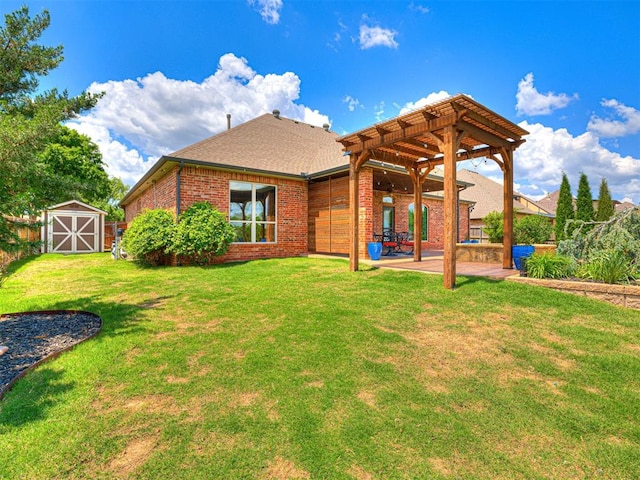 rear view of house featuring a storage unit, a lawn, an outbuilding, and brick siding