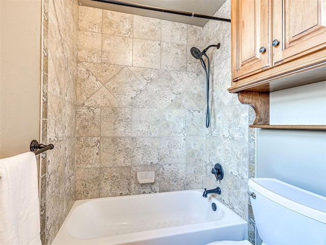 full bathroom with toilet and bathing tub / shower combination