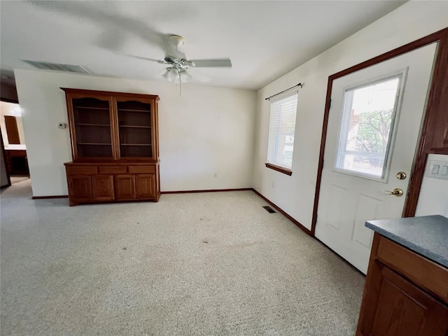 36040 E 1140th Rd Unit 114Rd, Seminole, OK 74868 - entrance foyer with a ceiling fan and baseboards