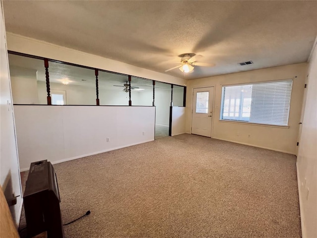 36040 E 1140th Rd Unit 114Rd, Seminole, OK 74868 - carpeted empty room featuring ceiling fan and baseboards