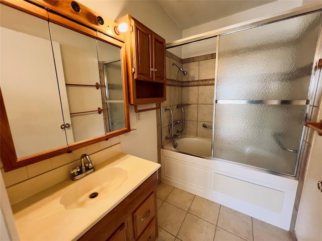 36040 E 1140th Rd Unit 114Rd, Seminole, OK 74868 - full bath featuring vanity, enclosed tub / shower combo, and tile patterned flooring