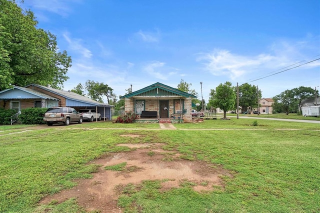 bungalow-style house with a porch and a front lawn