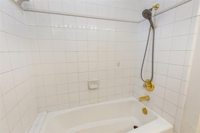 full bath with shower / tub combination