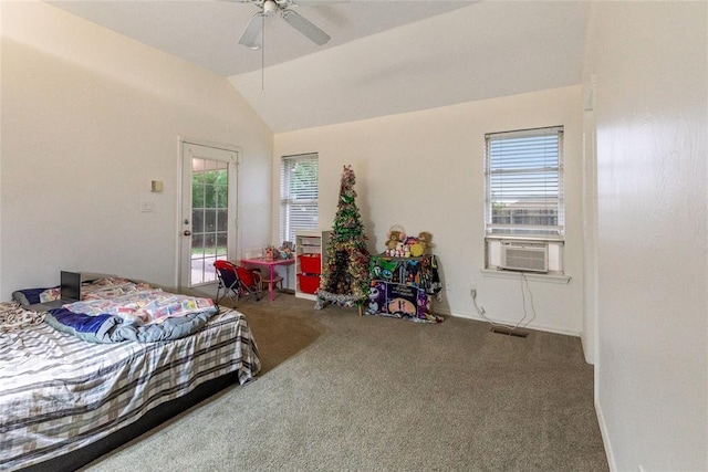 bedroom with carpet, vaulted ceiling, multiple windows, ceiling fan, and baseboards