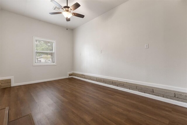 5102 N Beaver Ave, Bethany, OK 73008 - unfurnished room featuring wood finished floors, ceiling fan, and baseboards