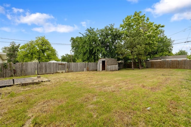 5102 N Beaver Ave, Bethany, OK 73008 - view of yard featuring a storage unit and an outbuilding