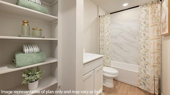 10509 SW 23rd St, Yukon, OK 73099 - bathroom with toilet, wood finished floors, shower / bath combo with shower curtain, vanity, and recessed lighting