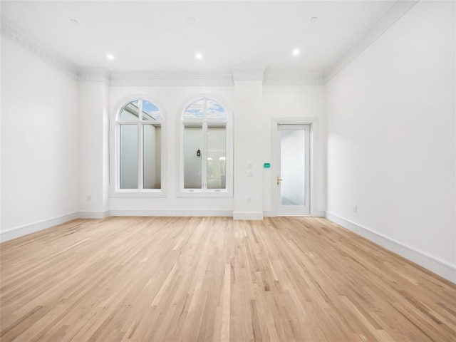 6100 NW Grand Blvd Unit 6103, Oklahoma City, OK 73118 - unfurnished living room featuring light wood finished floors, crown molding, and baseboards