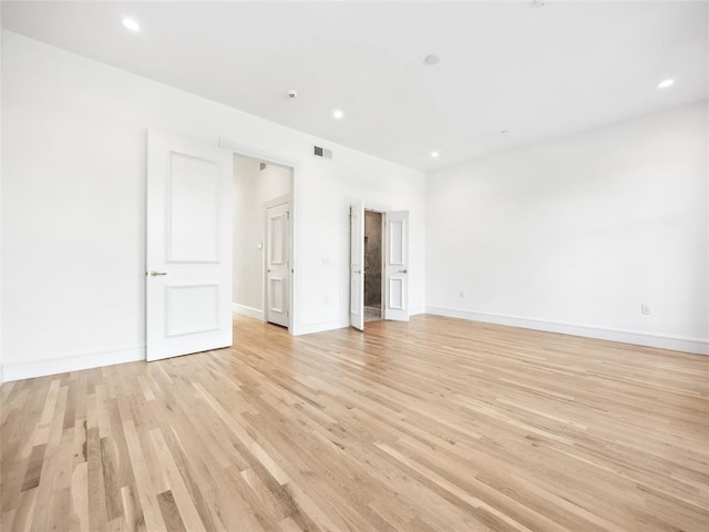 6100 NW Grand Blvd Unit 6103, Oklahoma City, OK 73118 - unfurnished room with light wood-style floors, baseboards, and recessed lighting