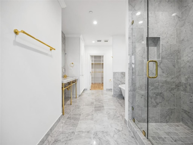 6100 NW Grand Blvd Unit 6103, Oklahoma City, OK 73118 - full bathroom featuring a shower stall, marble finish flooring, a walk in closet, a soaking tub, and recessed lighting