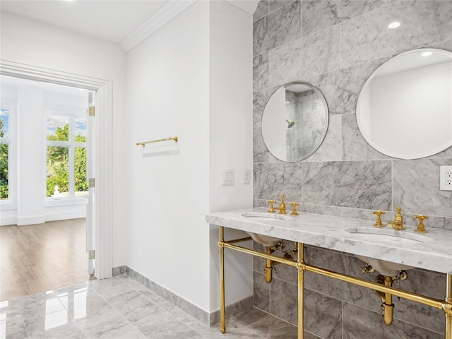 6100 NW Grand Blvd Unit 6103, Oklahoma City, OK 73118 - full bath with a sink, marble finish flooring, baseboards, and crown molding