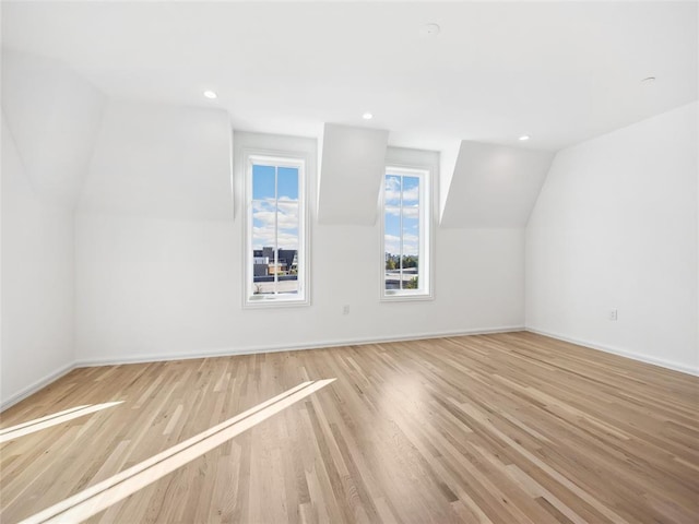 6100 NW Grand Blvd Unit 6103, Oklahoma City, OK 73118 - additional living space featuring wood finished floors, lofted ceiling, baseboards, and recessed lighting