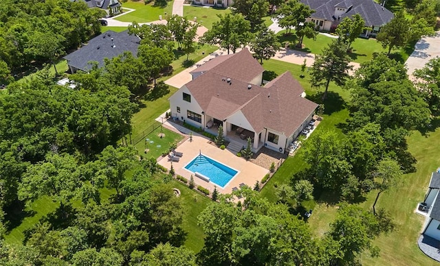 aerial perspective of suburban area with a pool area