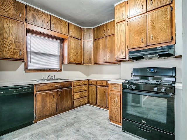 kitchen featuring black appliances, under cabinet range hood, a sink, light countertops, and brown cabinets