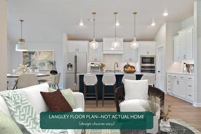 living room with light wood-type flooring, recessed lighting, and vaulted ceiling