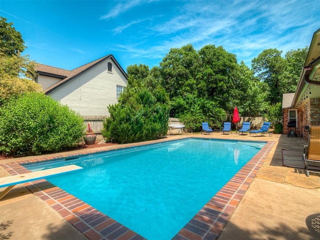 1409 Echohollow Trl, Edmond, OK 73025 - view of pool featuring a patio area and a diving board