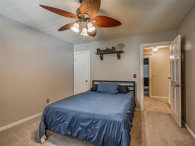 1409 Echohollow Trl, Edmond, OK 73025 - bedroom featuring light carpet and ceiling fan