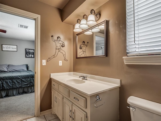 1409 Echohollow Trl, Edmond, OK 73025 - ensuite bathroom with vanity and tile patterned flooring
