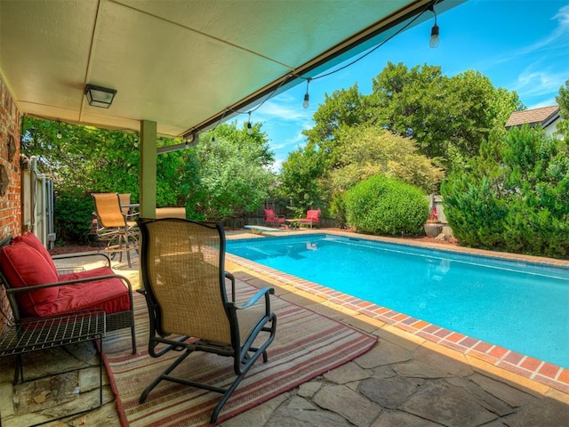 1409 Echohollow Trl, Edmond, OK 73025 - swimming pool with a patio area and a fenced backyard