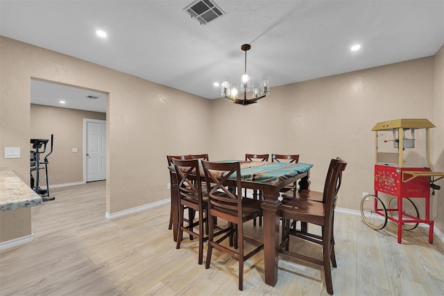 11747 N 2240th Rd, Cordell, OK 73632 - dining room featuring light wood-type flooring, baseboards, a chandelier, and recessed lighting