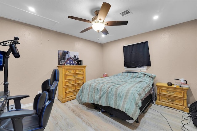 11747 N 2240th Rd, Cordell, OK 73632 - bedroom featuring attic access, light wood-type flooring, ceiling fan, and recessed lighting