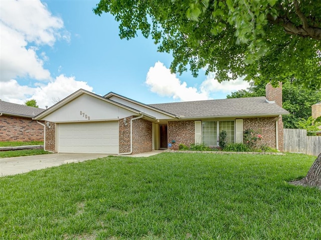 8709 NW 86th St, Oklahoma City, OK 73132 - single story home with an attached garage, driveway, a chimney, and brick siding
