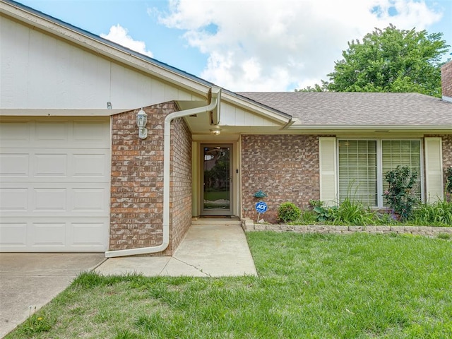 8709 NW 86th St, Oklahoma City, OK 73132 - property entrance with brick siding, a lawn, and a shingled roof