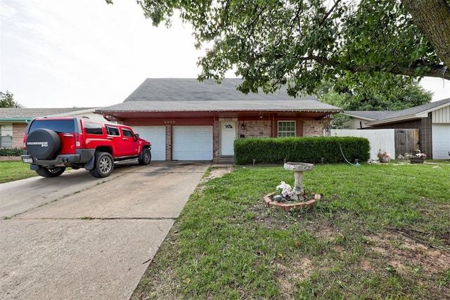 6508 S Harvey Ave, Oklahoma City, OK 73139 - ranch-style home featuring an attached garage, driveway, and brick siding