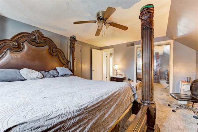 6508 S Harvey Ave, Oklahoma City, OK 73139 - bedroom with carpet flooring, ceiling fan, and a textured ceiling