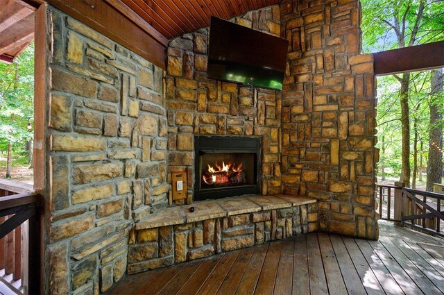 479 Poplar Cir, Broken Bow, OK 74728 - detailed view of an outdoor stone fireplace and stone siding