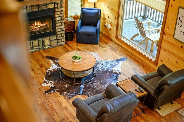 479 Poplar Cir, Broken Bow, OK 74728 - living room with hardwood / wood-style flooring and a stone fireplace
