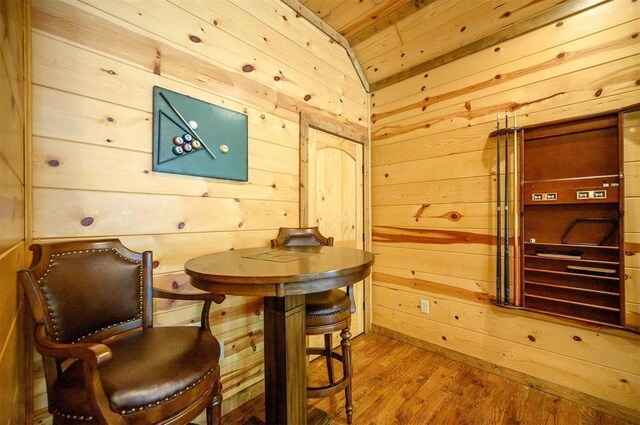 479 Poplar Cir, Broken Bow, OK 74728 - dining space with wooden walls, wood finished floors, and wooden ceiling
