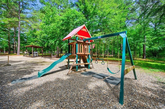 479 Poplar Cir, Broken Bow, OK 74728 - communal playground with view of wooded area