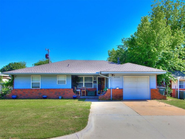 4704 Lisa Ln, Oklahoma City, OK 73115 - ranch-style house with brick siding, a garage, driveway, and a front lawn
